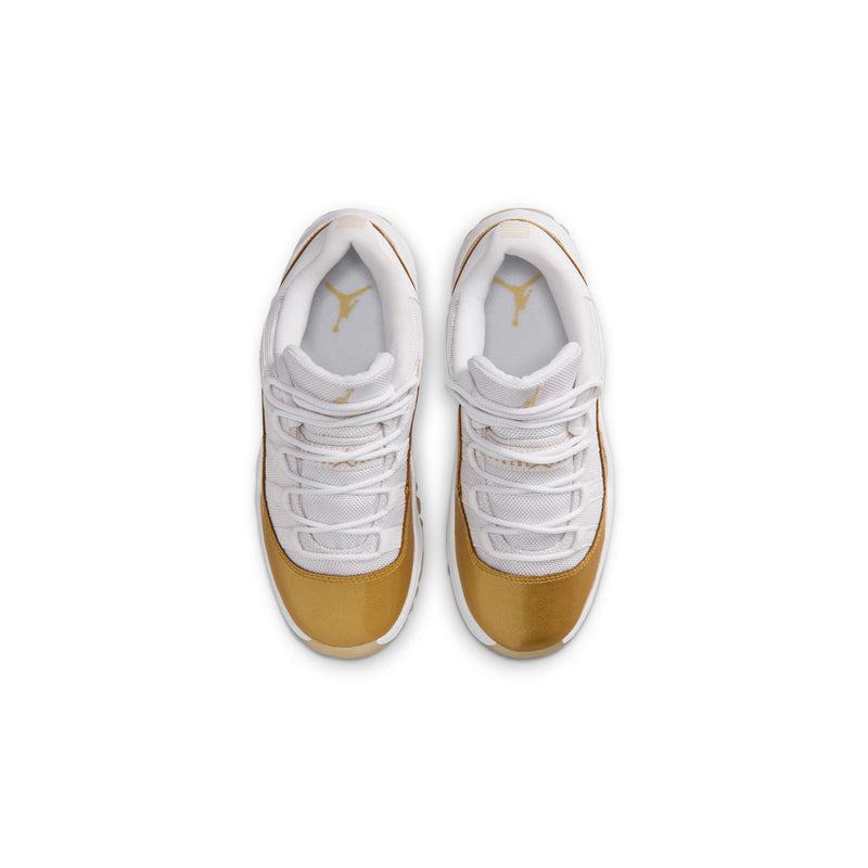 Kids sneakers pair showing white laces and gold toe trim