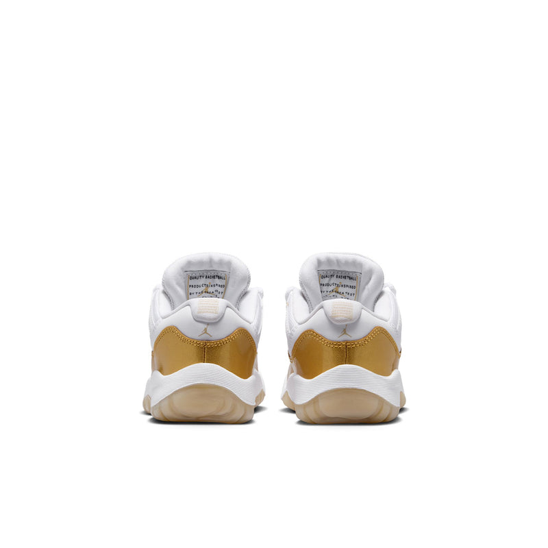 Kids sneakers from back with white heel counter and gold back panel