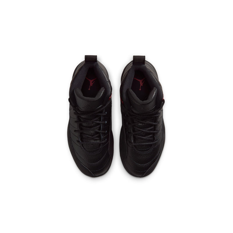 Kids black high-top sneakers from behind with red logo on the tongue and lace area