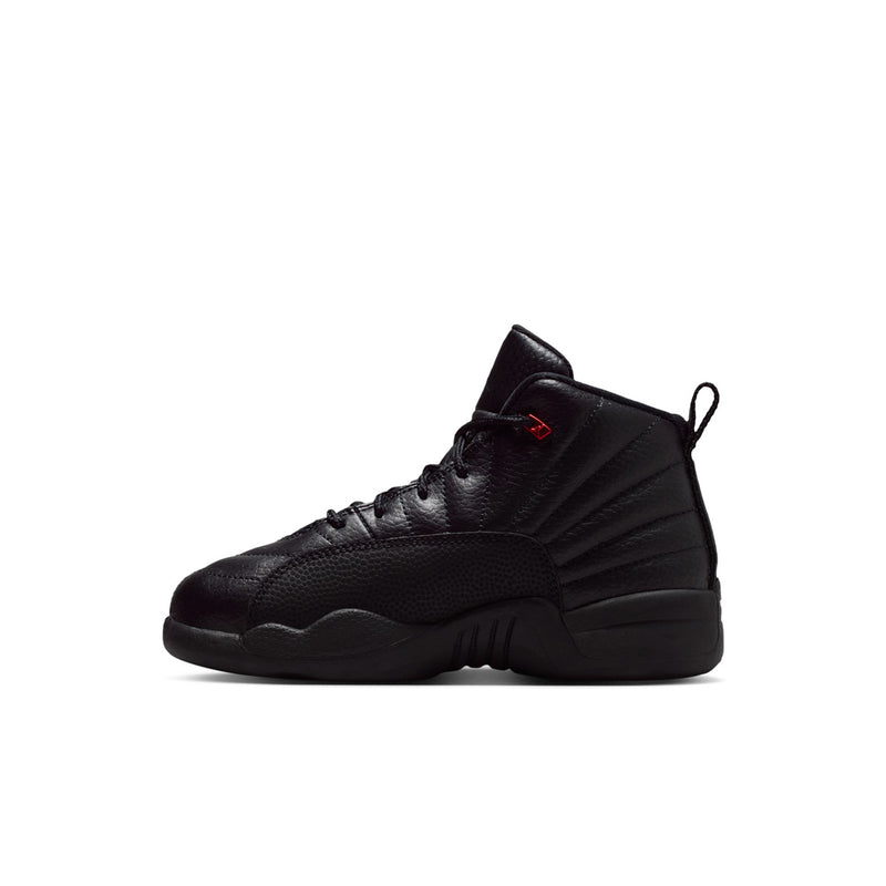 Kids black high-top sneakers, side view with red logo on the upper and lace-up closure