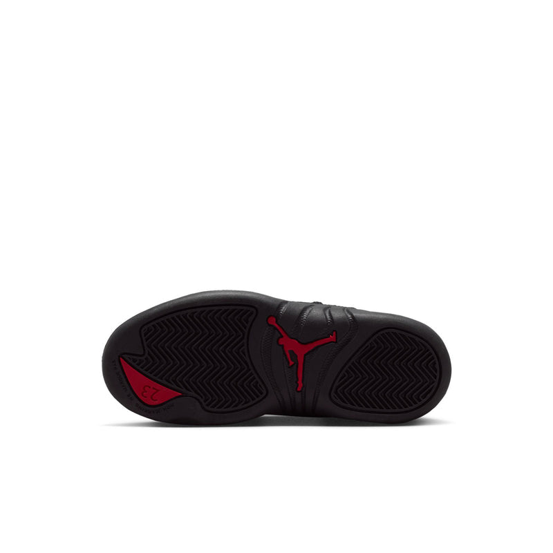 Kids black sneaker outsole with red Jumpman logo and textured tread pattern
