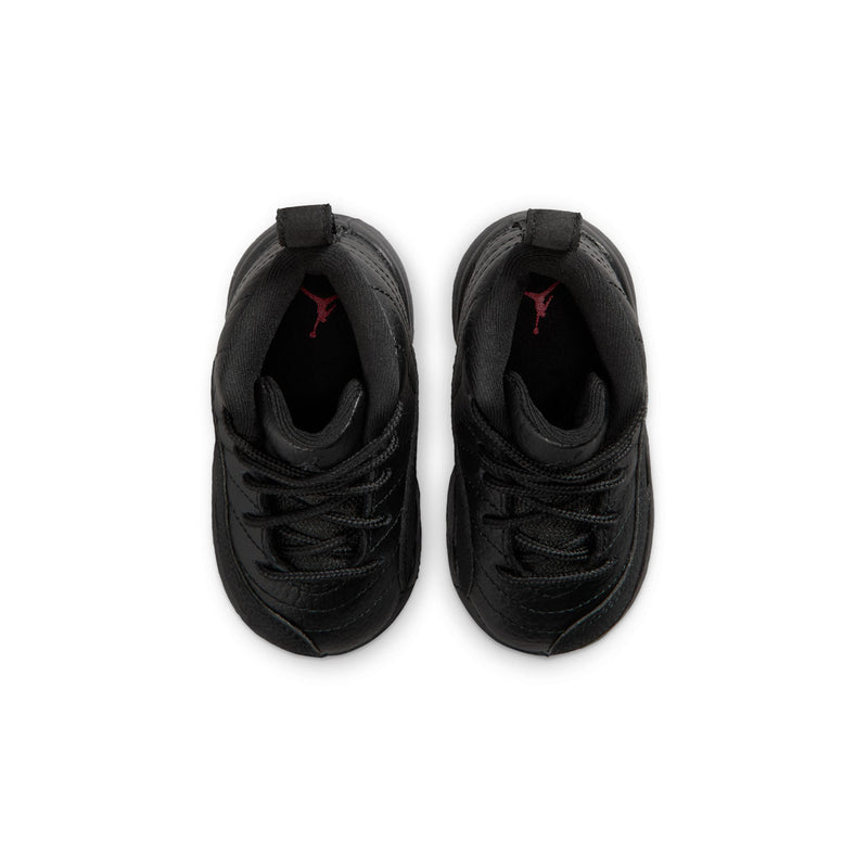 Black toddler high-top sneakers with padded collar, lace-up, and red lining inside