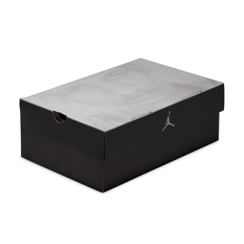 Retro 4 shoebox with gray ribbed lid and black base, featuring a Jumpman logo.