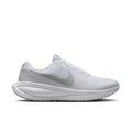 Women’s white knit running shoes with light-blue heel lining and lace-up closure