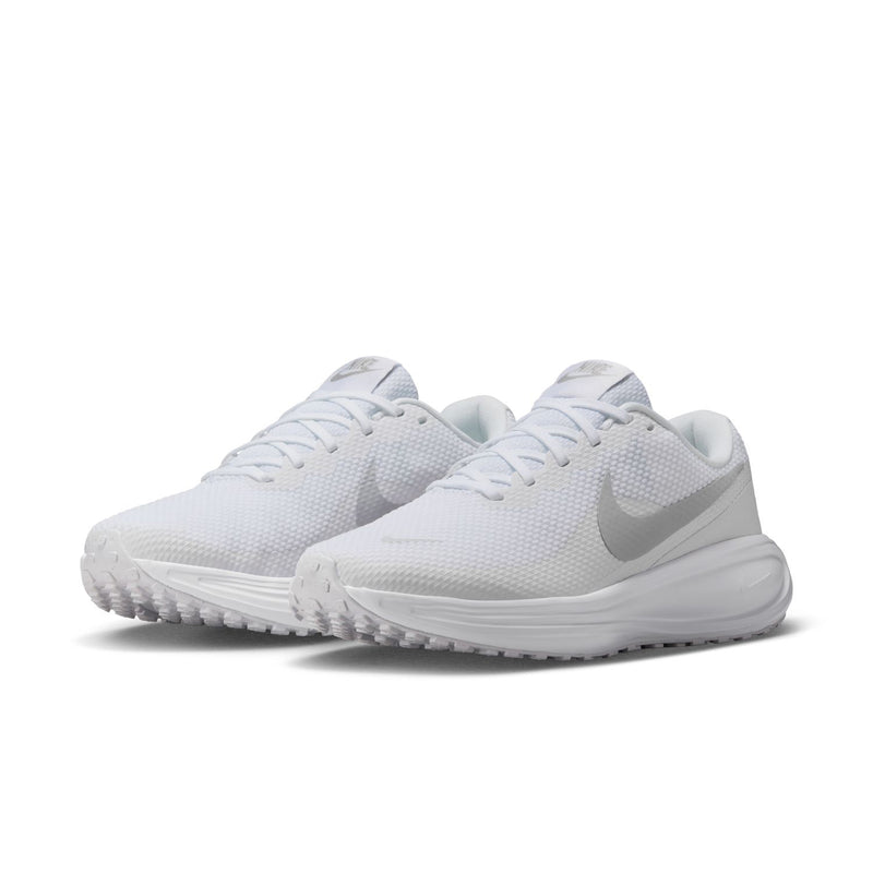 Pair of white lace-up running shoes with cushioned midsole and Nike swoosh