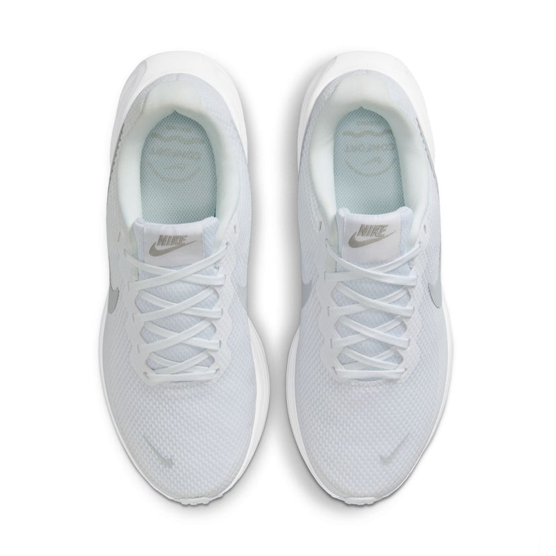 White lace-up running shoes, top-down view with mesh upper and Nike swoosh
