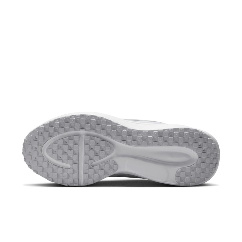 White rubber outsole with multidirectional traction pods and curved midsole edge