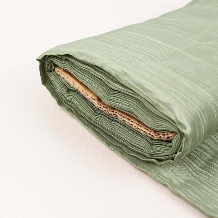 Rolled green fabric with textured surface detail