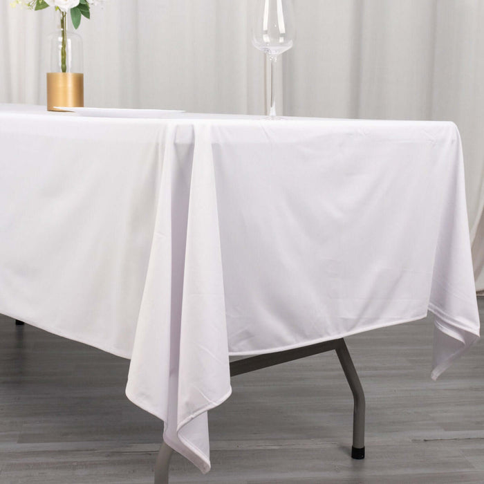 White tablecloth draped over a table in a clean, elegant setting.