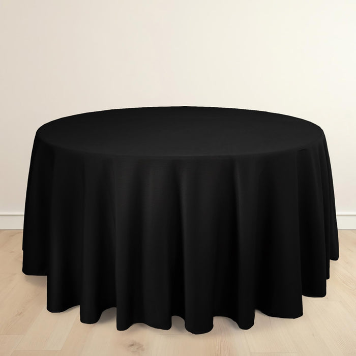 Round black tablecloth draped over a circular table.
