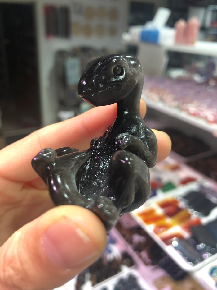Silver obsidian dinosaur