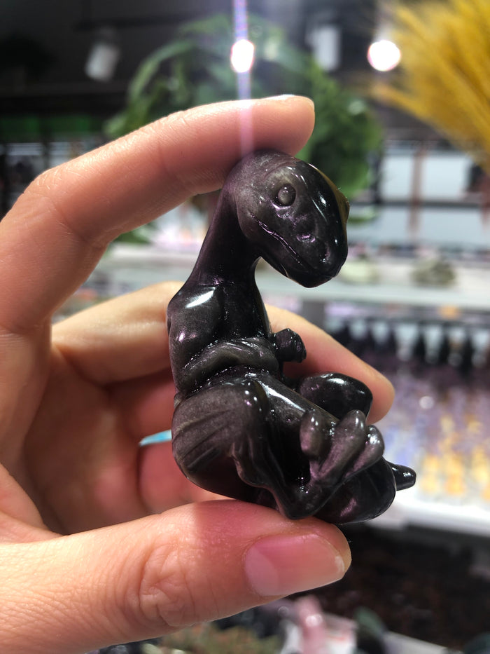 Silver obsidian dinosaur