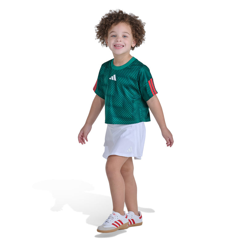 Kids green soccer skort set with adidas logo on tee and white skort