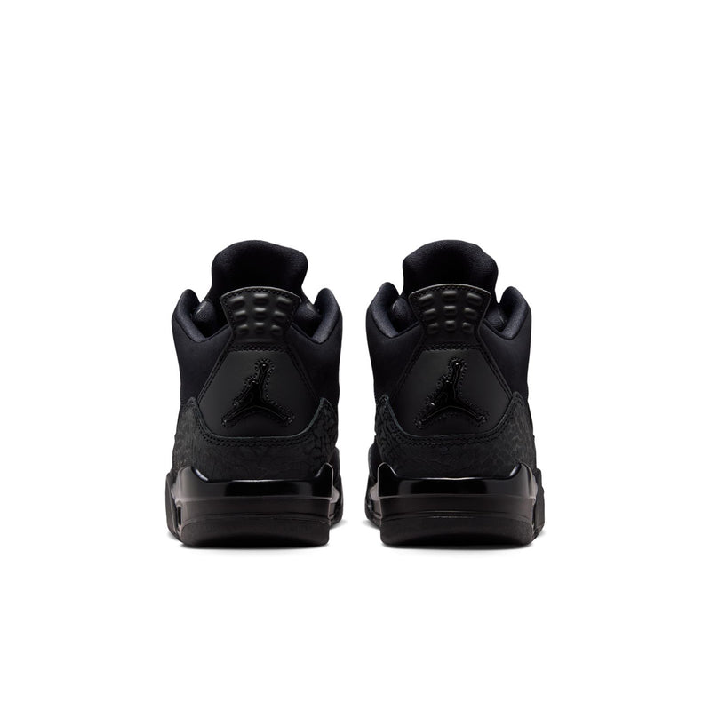 Black youth basketball shoes, back view with heel overlays and stacked sole