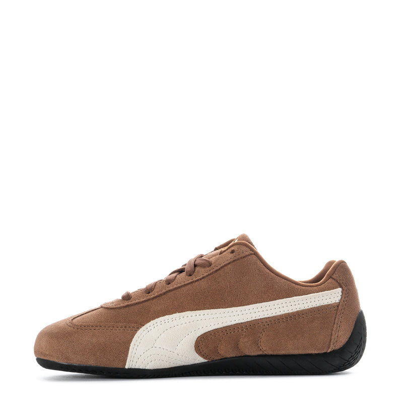 Brown suede low-top sneaker with white stripe and black rubber sole
