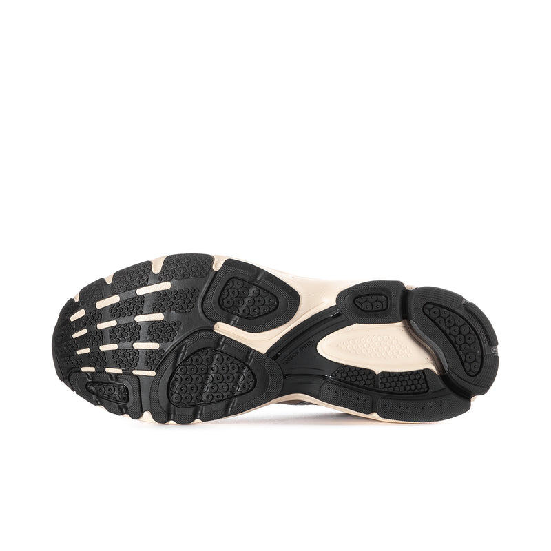 Men's running shoe outsole with dark rubber tread and light midsole panels