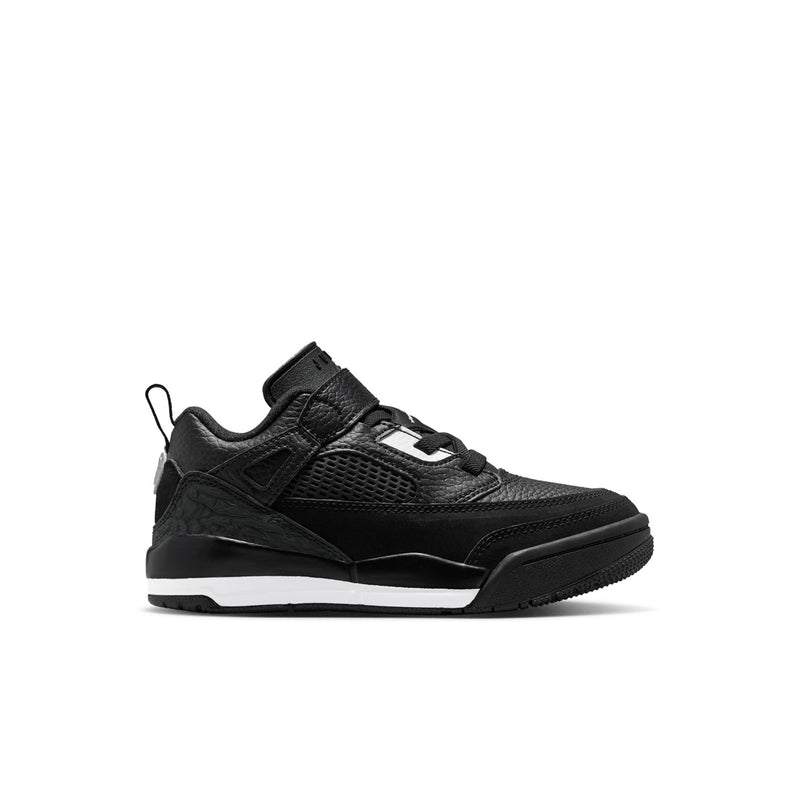 Kids black low-top sneakers with white logo accents, hook-and-loop strap, lace-up