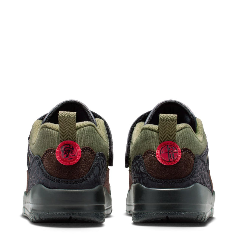 Kids sneaker back view with olive heel, black lace panel, red circular heel logo