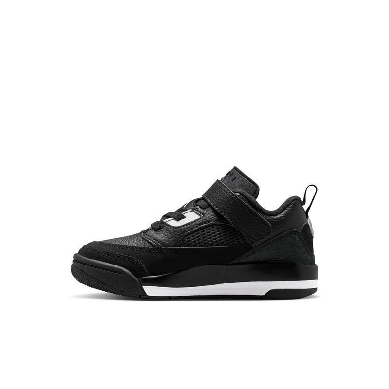 Kids black low-top sneakers with mesh panels, white logo accents, lace-up