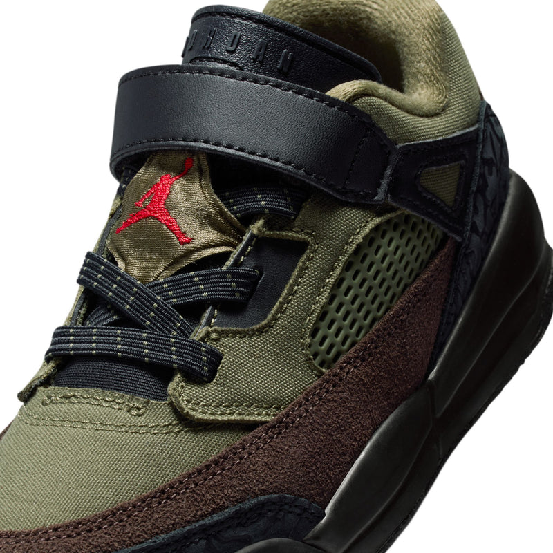 Kids sneaker close-up: olive mesh upper with black strap, red Jumpman-style mark