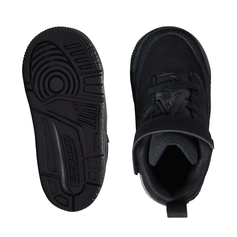 Black toddler sneaker outsole and inner side view