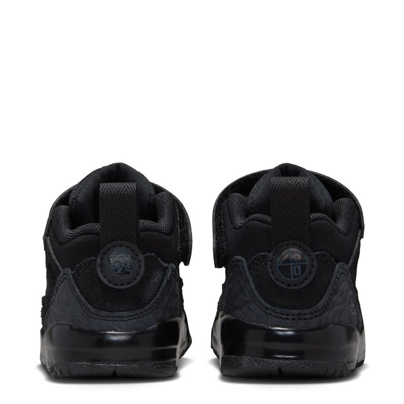 Back view of black toddler sneakers with heel pull tab and cushioned collar