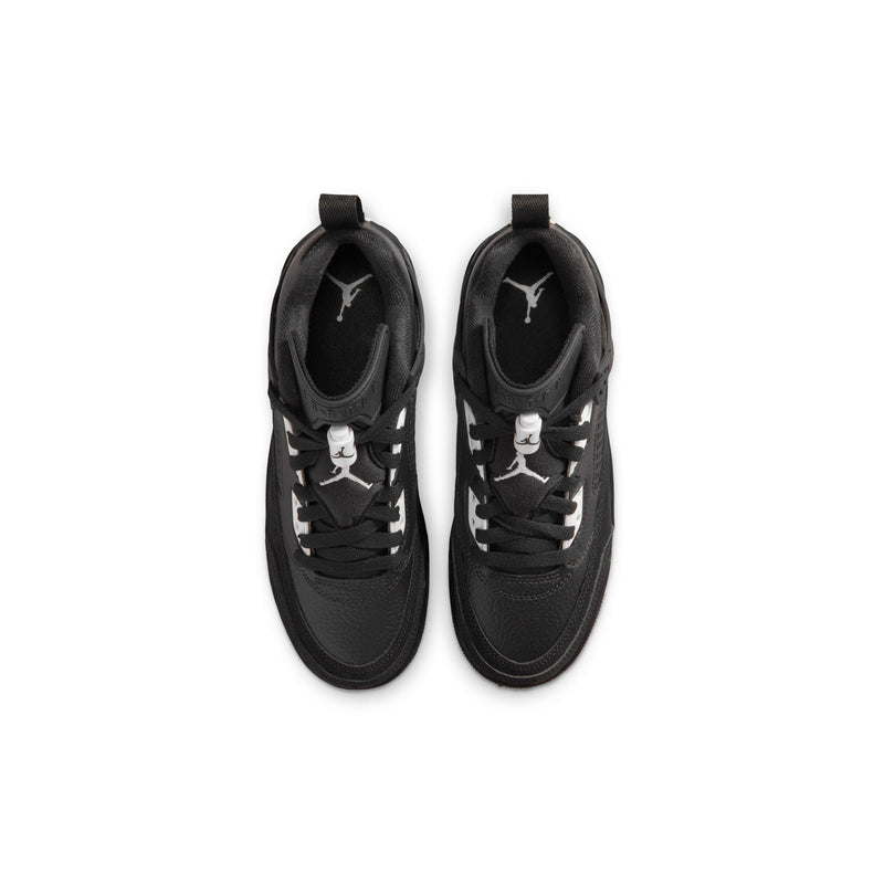Pair of youth black low-top sneakers with laces and enclosed tongue view