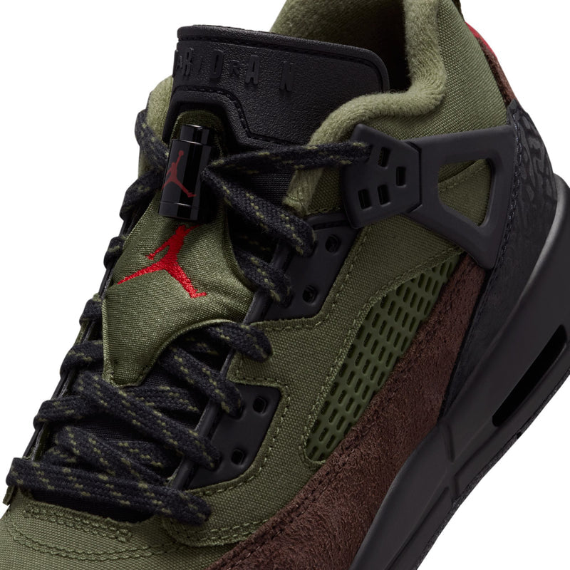 Youth low-top sneakers close-up: olive mesh, dark gray cage, brown panel, lace-up.