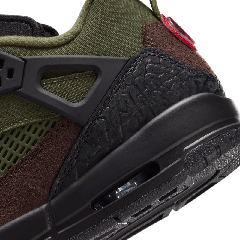 Youth sneaker close-up: black textured overlay with air-window sole, olive and brown upper.