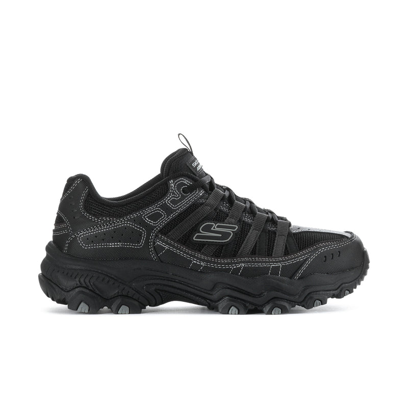 Men's black athletic sneakers with chunky trail sole and lace-up closure