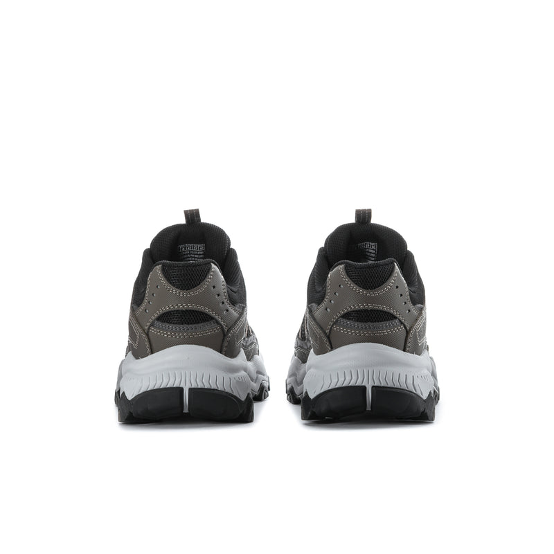 Men's wide athletic sneaker in brown and black, heel view with low-profile back pull tab