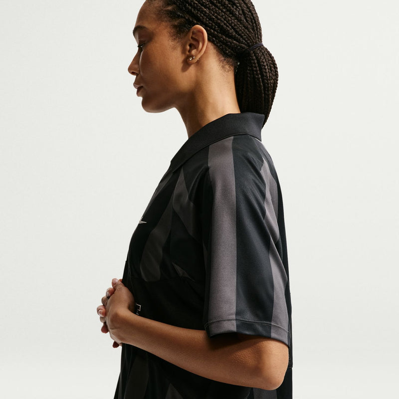 Women’s black striped jersey polo with pointed collar, short sleeves, Nike swoosh
