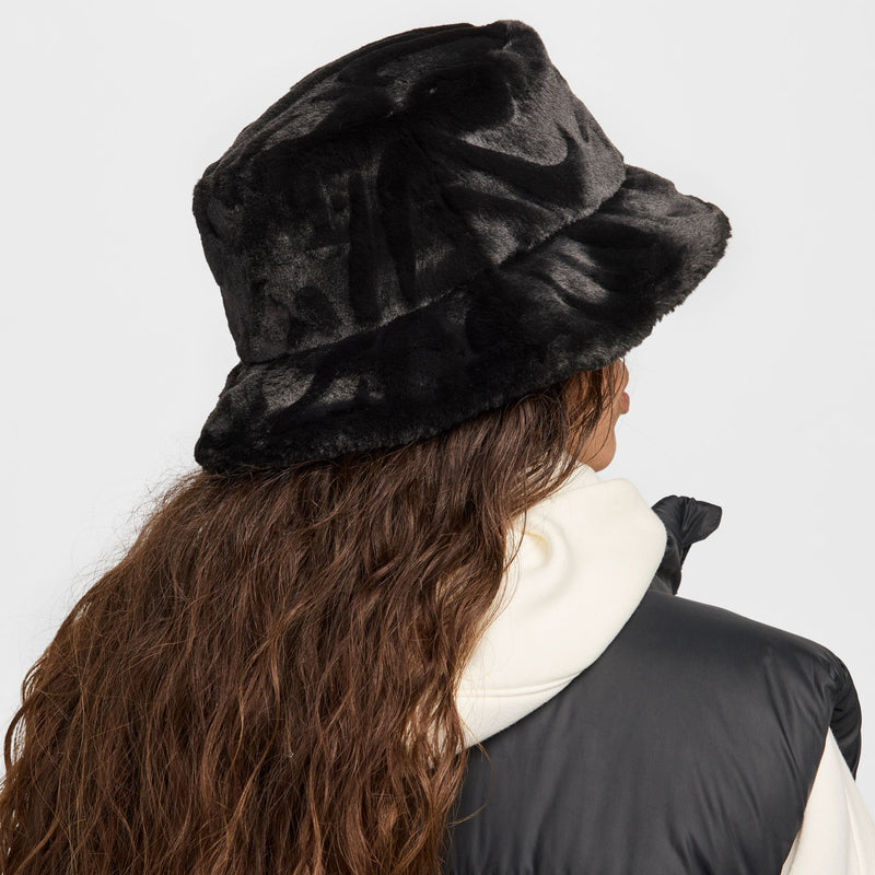 Black faux fur bucket hat from back view, layered folds on the brim