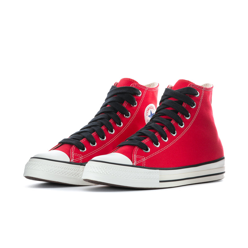 Pair of men's red high-top sneakers with black laces and white midsoles