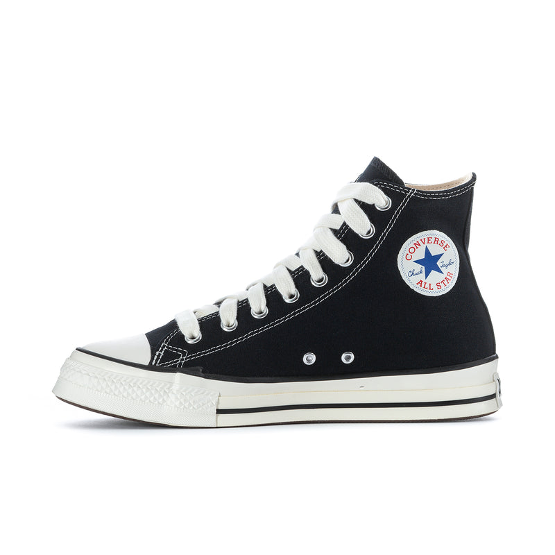 Black high-top Converse sneakers with white laces and red/blue All Star emblem