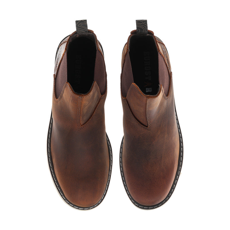 Brown ankle chelsea boots with dark interior and side cutout detail