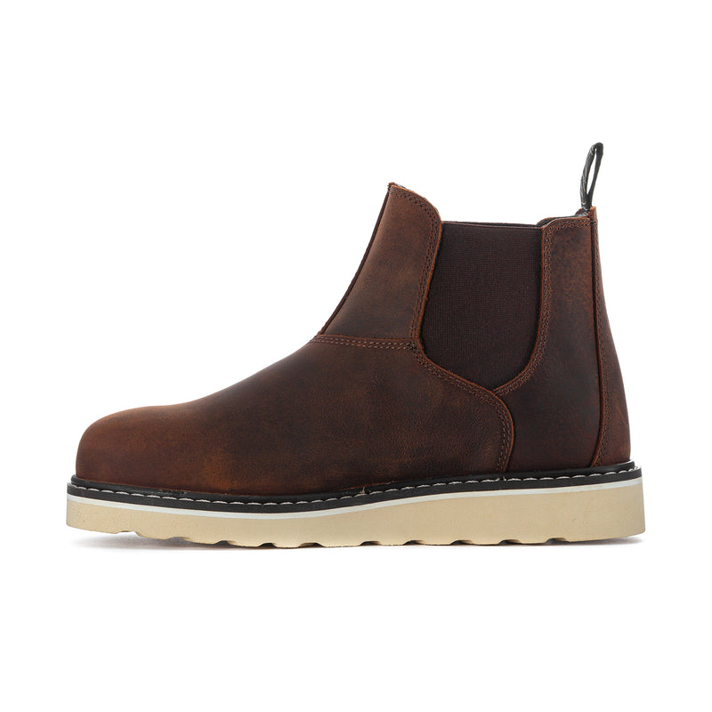 Brown ankle chelsea boot with elastic gusset, side panel stitching, and pull tab