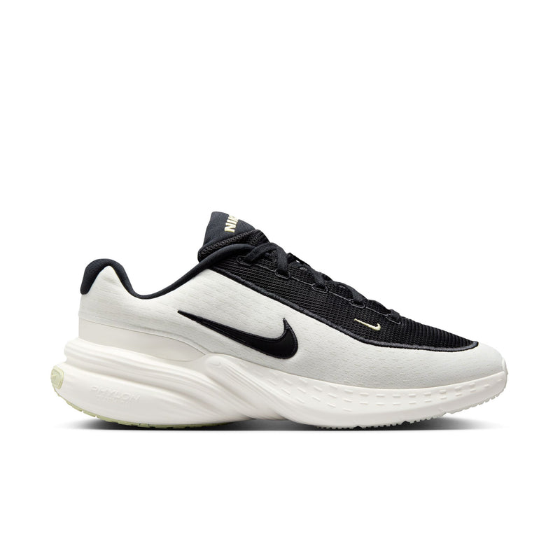 Men's running shoes in black and sail with lime accent, cushioned white sole