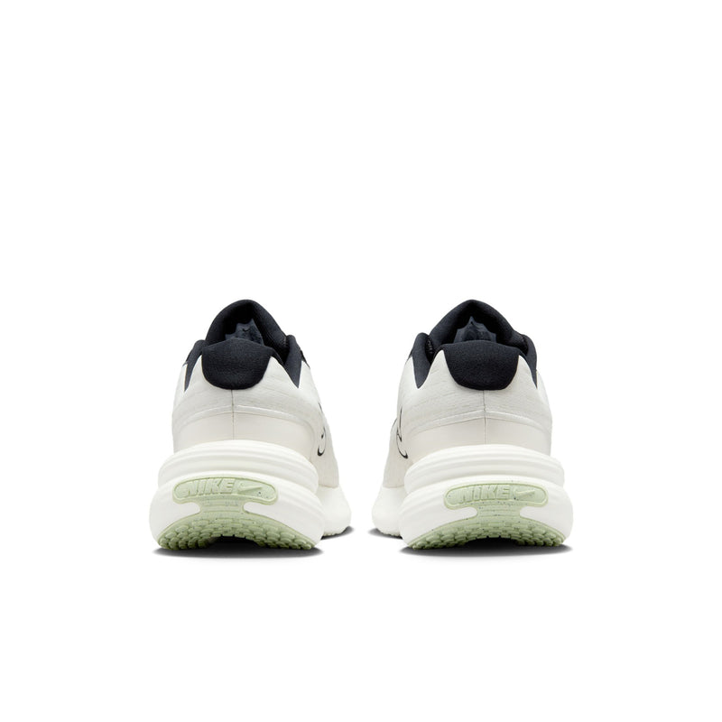 Men's sneakers heel view, white back with lime-green outsole edge
