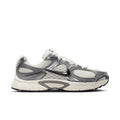 Men's athletic sneaker in dark gray, black, and white with mesh overlays and chunky sole