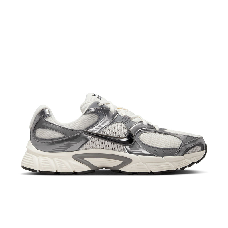 Men's athletic sneaker in dark gray, black, and white with mesh overlays and chunky sole