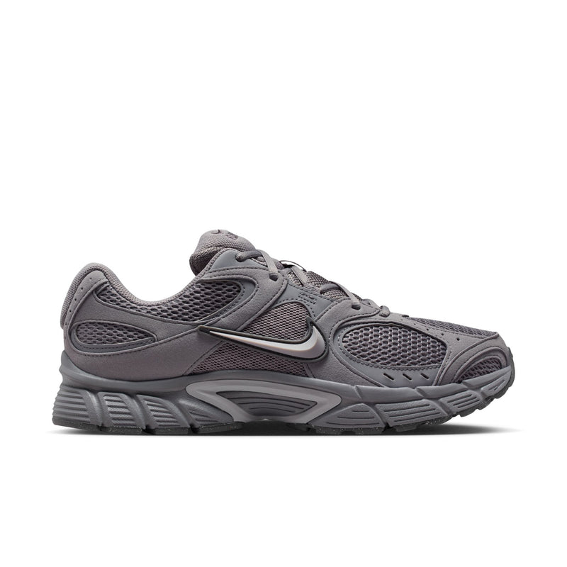 Men's grey running shoe with mesh upper, lace-up closure, and Nike Swoosh.