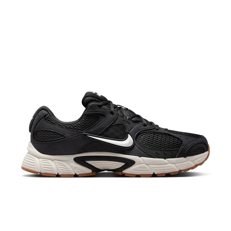 Men's black Nike running shoes with white midsole and gum-brown outsole