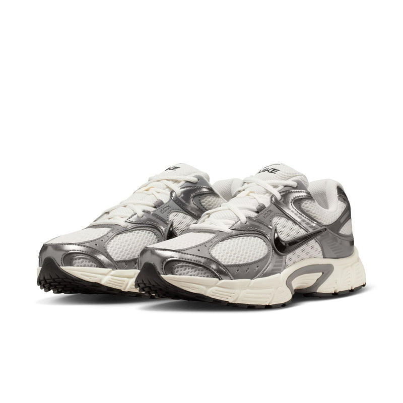Men's athletic sneaker, side view, light gray and dark gray panels with cream midsole