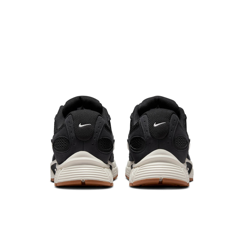 Men's black Nike running shoes rear view with heel tabs and white midsole