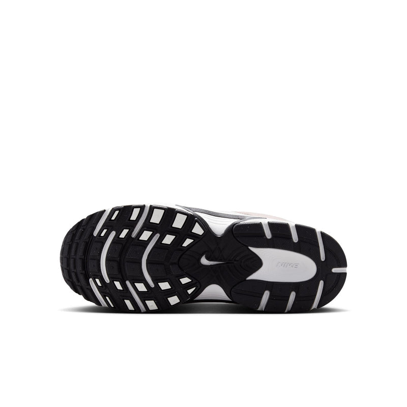 Youth sneakers outsole, black tread pattern with white midsole.