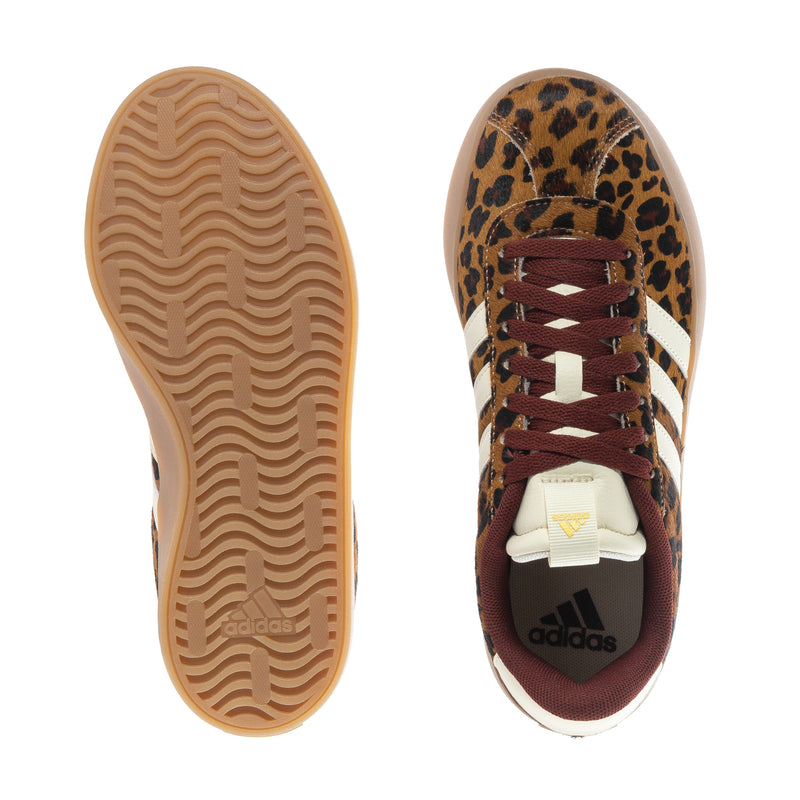 Sneaker outsole and heel view with leopard side panel and adidas branding