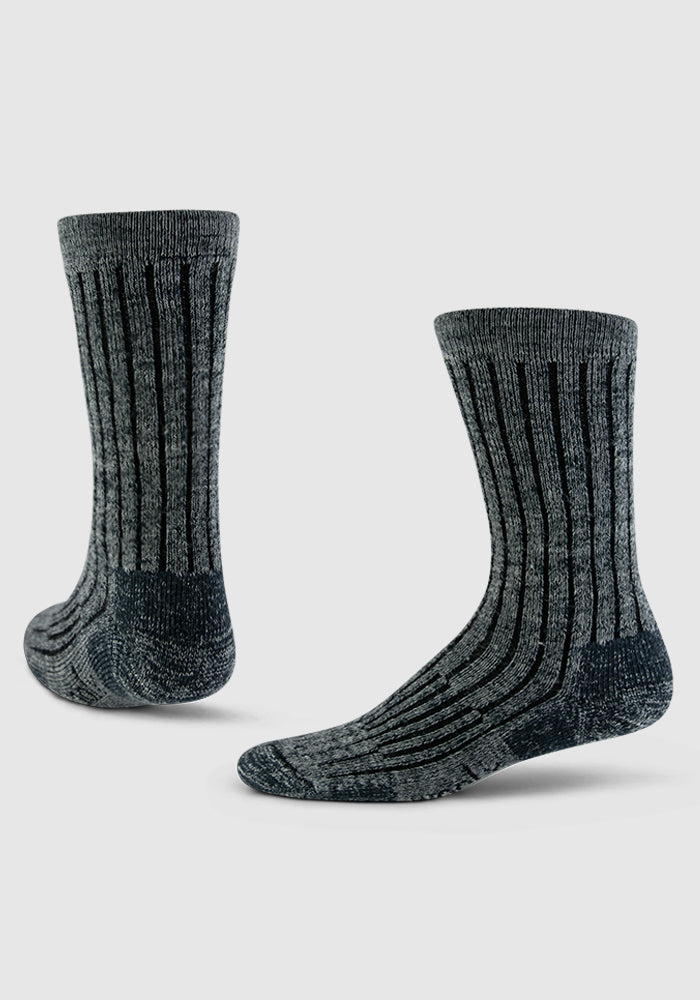 Two Joey Crew Socks in Stone Grey from Woolx are shown against a light gray background. Made with a silk blend, they feature textured horizontal and vertical ribbing for a stylish and cozy appearance.