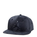 Youth black snapback cap with embroidered Jumpman jacquard pattern